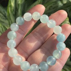 DETAILS: Size: 10mm round beads (19 beads) approx  Weight: 27.2g  Qty: 1pcs 100% Genuine & Natural AQUAMARINE Its name comes from the Latin for seawater and it was said to calm waves and keep sailors safe at sea. March's birthstone was also thought to enhance the happiness of marriages. The best gems combine high clarity with limpid transparency and blue to slightly greenish blue hues. Like many beryls, aquamarine forms large crystals suitable for sizable fashioned gems and carvings. Packages wi Aquamarine Beaded Bracelet, Aquamarine Bracelet Beads, Birthday Stone, March Birthday, Aquamarine Beads, Bracelet Crystal, Greenish Blue, Aquamarine Blue, Natural Aquamarine