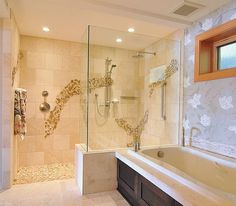 a bath room with a large tub and a walk in shower