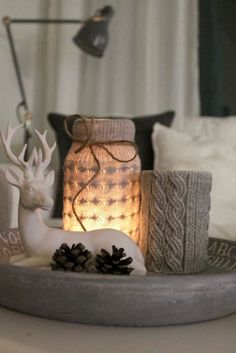 a tray with candles and decorations on it