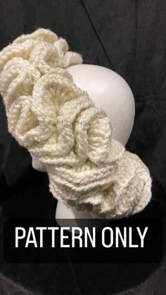 a knitted headband on a mannequin's head with the words pattern only written across it