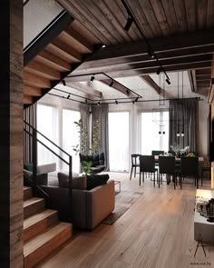 a living room filled with furniture next to a wooden floor covered in lots of windows