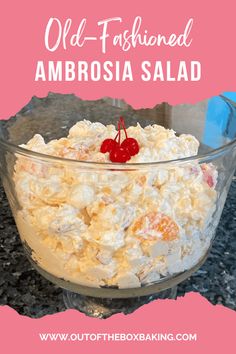 an old fashioned ambrosia salad in a glass bowl with a cherry on top