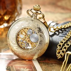 This very unique unisex mechanical pocket watch has been able to win thousands of hearts since it is launched. Its mechanical feature and stationary bezel function have proven to be highly beneficial for daily usage. This watch with stainless steel dial of 1.69 diameters is available in black, bronze, and golden colors. SpecificationsMovement: Mechanical Hand WindCase Material: Stainless SteelCase Shape: RoundDial Display: ANALOGFeature: MechanicalBezel Function: StationaryDial Window Material T Bronze Gifts, Luxury Gift Set, Pocket Watch Necklace, Mechanical Pocket Watch, Mechanical Hand, Fob Watch, Clock Gift, Watch Repair, Mens Watches Black