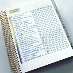 a spiral notebook with a checklist on the page and a pen next to it