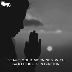 the silhouette of a woman with her hands in front of her face, saying start your mornings with gratitue & intention