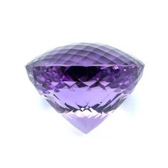 This is a perfect gift for the person who has everything! This stunningly beautiful, round amethyst gemstone weighs a whopping 651 carats and would make a breathtakingly impressive desk accessory. The top of the gemstone, aka the "crown," has been faceted as a "checkerboard" that gives this jewel exceptionally brilliant sparkle and life! An executive paperweight for sure! Amethyst measures 2-3/16" in diameter by 1-11/16" in depth. It weighs 651 carats, or 130.2 grams (4.59 oz.) Please feel free Luxury Amethyst Gemstones For Gift, Luxury Amethyst Gemstones As Gift, Luxury Faceted Amethyst Ring For Formal Events, Luxury Faceted Amethyst Ring For Formal Occasions, Luxury Amethyst Gemstones Round Cut, Luxury Purple Amethyst Gemstones, Brilliant Cut Amethyst Gemstones As Gift, Amethyst Gemstones With Brilliant Cut For Gift, Luxury Purple Gemstones For Gift