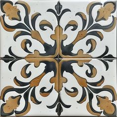 a white and black tile with an intricate design on the bottom half, in different colors