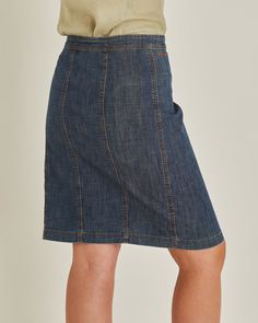 A timeless piece that effortlessly blends the best of Y2K style with contemporary chic. This skirt features a distinctive front zip that opens from both ends, adding a playful and functional twist to your outfit. The classic denim fabric offers comfort and durability, making it the perfect choice for any casual occasion. Pair it with a crop top and chunky sneakers for a throwback look, this skirt is your key to effortlessly stylish versatility. Elevate your wardrobe with a touch of Y2K nostalgia Fitted Knee-length Denim Skirt With Pockets, Fitted Denim Blue Skirt With Button Zip Fly, Dark Wash Cotton Skirt With Button Zip Fly, Workwear Mini Skirt With Zip Fly, Casual Denim Skirt With Zipper Closure, Fitted Denim Pencil Skirt With Pockets, Denim Blue Pencil Skirt With Pockets, Medium Wash Knee-length Skirt For Work, Casual Fitted Skirt With Zip Fly