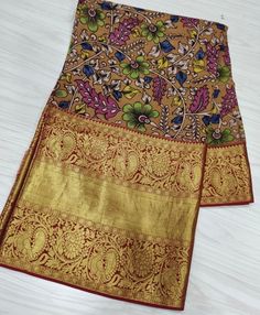 1.this is beautiful pure kanjivaram penkalamkari silk sari with handpaint design with running blouse piece  2.this sari is 5.5 mt length  3.this is a very elegant looking sari for all occasions like weddings and other formal events  4.fall n pico is complimentary  5.blouse can be made as per the requirements of the clients with proper measurements.stiching charges will be extra 6.plz check the availability of the sari before placing the order Multicolor Silk Kalamkari Pre-draped Saree, Multicolor Silk Pre-draped Saree With Kalamkari Print, Pre-draped Tussar Silk Saree With Kalamkari Print, Kalamkari Print Art Silk Pre-draped Saree For Wedding, Anarkali Pre-draped Saree With Kalamkari Print For Festivals, Pre-draped Kalamkari Print Saree For Festivals, Wedding Pre-draped Saree In Kalamkari Print Art Silk, Wedding Pre-draped Saree With Kalamkari Print In Art Silk, Bollywood Style Kalamkari Print Pre-draped Saree