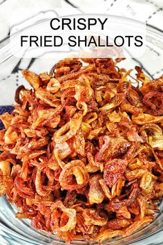 crispy fried shallots in a glass bowl with text overlay that reads crispy fried shallots