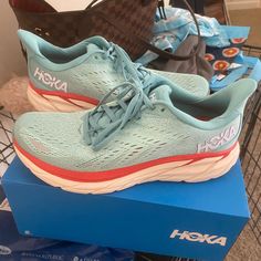 Worn Twice. Basically Brand New Condition. They Were Just Too Big For Me. Blue Color With Orange/Coral Accent. Spring Blue Running Shoes With Boost Midsole, Blue Running Shoes For Spring, Shoes Hoka, Hoka One One Woman, Coral Accents, Eggshell Blue, Hoka Clifton, Summer Songs, Hiking Sneakers