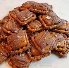 chocolate covered pretzels sitting on top of a white counter