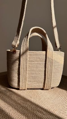 Natural Rectangular Canvas Bag With Braided Handles, Rectangular Natural Canvas Bag For Daily Use, Natural Rectangular Canvas Bag For Daily Use, Rectangular Jute Bag With Adjustable Strap, Eco-friendly Natural Canvas Bag With Double Handle, Everyday Neutral Jute Bags, Rectangular Jute Straw Bag With Adjustable Strap, Natural Jute Bucket Bag For Daily Use, Natural Color Canvas Bag With Adjustable Strap For Everyday