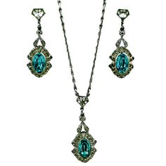 Art deco clear and aquamarine paste parure of drop earrings and pendant necklace set in sterling silver. Earrings with screw back fittings. 1930s USA.
 Earrings: 1 3/8" Chain 16.5" Pendant 1.5"
 Excellent condition Black Dangle Earrings, Accessories Stand, Earrings Sets, Long Chain Earrings, Clear Earrings, Bridal Earrings Drop, Gemstone Pendant Necklace, Long Drop Earrings, Gemstone Necklace Pendant