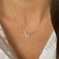 A stunning sterling silver necklace with two different interlocking infinity links. The sterling silver interlocking infinity necklace is a chic and classic piece that would be a fabulous gift for any age. Each necklace arrives in a beautiful White gift box with a silver embossed logo. If you would like the necklace gift wrapped, please do not hesitate to ask and this can be done free of charge. made from: sterling silver dimensions: Large infinity link: 2cm Smaller infinity link: 1cm Available Giraffe Necklace, Chain Nose Pliers, Square Necklace, Buy Necklace, Infinity Necklace, White Gift Boxes, Link Necklace, Embossed Logo, Necklace Gift