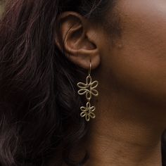 Combine the timelessness of nature's blooms and a nod to the 90s with these modern classics. These carefully crafted pieces add a splash of nostalgia to your style, celebrating the beauty of flowers while evoking memories of carefree days and sunny adventures. From dainty petals to bold blossoms, each piece is a joyful take on nature's artistry. These earrings have been lovingly hand carved in wax, then cast in metal using the lost wax casting process. Available in brass, sterling silver, gold vermeil (14k heavy gold plate over sterling silver), or 10k gold - please inquire for other metal types. Brass earrings come with 14k gold filled hooks and sterling silver have sterling silver hooks. 20mm wide and 50mm long including hook. These earrings are made to order - please allow about 1-2 wee Metalsmith Earrings, Nature-inspired Earrings For Anniversary, Yellow Gold Flower Earrings Nickel Free, Earrings Flower, Handmade Yellow Gold Flower Drop Earrings, Gold Plated Flower Dangle Earrings, Gold Plated Dangle Flower Earrings, Yellow Gold Flower Earrings For Pierced Ears In Brass, Brass Dangle Flower Earrings