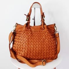 "Cognac Woven Leather Bag, Soft Woven Handbag, Leather Tote Woman, Handmade Shoulder Bag, Large Tote Bag, Modern Leather Crossbody Bag, Elow comes in two versions, LARGE: W 15\" x H 11.4\" x D 7.1\" & SMALL: W 13\" x H 10\" x D 6\". Handle drop: 4\" This bag has made by our italian partner and customizable by our team. We offer one free monogram or name personalization. Please check fonts, color thread, tag samples and leave your monogram or name to embroider. Features: Inside: The bag closes wi Cognac Rectangular Hobo Bag With Detachable Handle, Cognac Hobo Bag With Detachable Handle, Cognac Bag With Detachable Strap For Daily Use, Cognac Top Handle Bag For Everyday Use, Cognac Hobo Bag With Adjustable Top Handle, Cognac Hobo Bag With Top Handle And Adjustable Strap, Cognac Hobo Bag With Detachable Handle For Daily Use, Cognac Crossbody Hobo Bag For Shopping, Rectangular Cognac Hobo Bag With Leather Handles