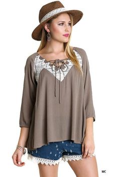 This peasant blouse has a great boho vibe. It features a V lace up neckline, 3/4 sleeves with elastic, lace detailing front and back, a high low hemline, lightweight and has a full cut a-line relaxed silhouette. Small B 40" L 24" : Medium Bust 42" L 24" : Large Bust 44" L 24" back is longer Affordable Summer Peasant Top For Spring, Cheap Peasant Blouse For Spring, Luxury Long Sleeve Peasant Top For Fall, Cheap Fall Peasant Top, Cheap Peasant Style Long Sleeve Tops, Cheap Peasant Top For Fall, Affordable Long Sleeve Peasant Top For Women, Affordable Women's Summer Peasant Top, Cheap Spring Peasant Top For Daywear