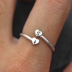 made by order Metal: Solid sterling silver Band size: 1.3mm  US size Store jewelry are unique crafted by order. Usually we select silver for the first metal to design or handmade your order, apart from that,we offer 14k yellow gold ,14k rose gold,18k yellow gold,18k rose gold material as well. And store jewelry are open for custom or personalization,pls free to ask for listing you are like,we will do for our best. pamela Minimalist Sterling Silver Stackable Rings With Initials, Dainty Initial Ring For Promise Occasions, Customizable Sterling Silver Open Ring, Dainty Sterling Silver Stackable Rings With Initials, Customizable Open Ring In Sterling Silver, Sterling Silver Initials Ring For Anniversary, Dainty Personalized Silver Heart Ring, Sterling Silver Open Ring Initial Ring For Anniversary, Sterling Silver Dainty Initial Ring