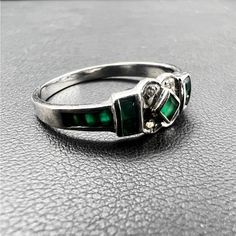 Beautiful And Absolutely Gorgeous 14k White Gold Ring. Embedded With Stunning Green Gemstones. Total Weight:2.2. Size 7.75. The Best Choice For You! Perfect Gift Formal Silver Birthstone Ring With Accent Stones, Silver Jewelry With Accent Stones In 14k White Gold, Silver Emerald Ring With Accent Stones For Formal Occasions, Silver Emerald Ring With Accent Stones For Formal Events, Silver Diamond Ring With Accent Stones For May Birthstone, Silver Diamond Ring With May Birthstone, Vintage White Gold Emerald Jewelry, Silver Sterling Diamond Ring With Stone Setting, Formal Silver Gemstones In 14k White Gold