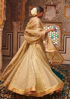 Editor's Note Light Yellow Embroidered Lehenga Set Fabric: Silk Organza, Chanderi Color: Light Yellow Care: Dry Clean Only About the Designer Itrh makes a high-end luxury Indian ethnic wear made using exquisite and endangered age-old crafts such as kalamkari, madhubani, chikankari, zardozi, and gota weaving. The focus of the house is to cherish the beauty of handcrafted luxury designer wear. Transitional Tissue Silk Lehenga With Traditional Drape, Transitional Traditional Drape Tissue Silk Lehenga, Elegant Chanderi Sherwani For Ceremonial Occasions, Transitional Organza Lehenga With Cutdana, Transitional Lehenga With Intricate Embroidery In Tissue Silk, Transitional Tissue Silk Lehenga With Intricate Embroidery, Transitional Lehenga With Pallu In Organza, Transitional Organza Lehenga With Sheer Dupatta, Semi-stitched Organza Lehenga For Transitional Season