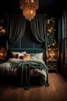 a bedroom with dark walls, wooden floors and a chandelier hanging from the ceiling