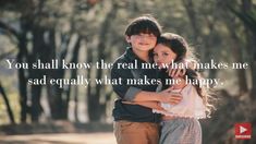 two young children hugging each other in the woods with a quote about love and affection