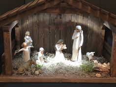 a nativity scene with baby jesus in the manger