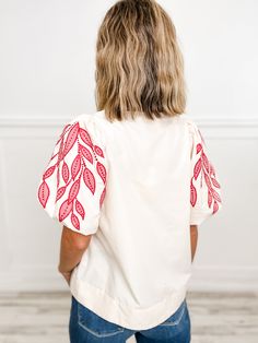 Elevate your style with our Solid V-Neck Bubble Sleeve Top! The unique leaf embroidery adds a touch of elegance, while the bubble sleeves add a playful flair. Perfect for any occasion, this top is both versatile and fashionable. Turn heads and make a statement with this must-have addition to your wardrobe. Fabric- 80% Polyester, 20% Cotton, Contrast: 50% Polyester, 50% Rayon Bubble Sleeve Top, Emma Lou, Must Haves, V Neck, Bubbles, Boutique, Turn Ons, Wardrobe, Embroidery