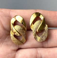 "Add a touch of sophistication and class to your wardrobe with these beautiful vintage earrings.  These signed Napier earrings boast a gold-tone chain link design, making them a timeless accessory that can be dressed up or down. The earrings are perfect for any occasion and will make a great addition to your jewelry collection. 1 1/8\" by 58\". Marked Napier on the back of both earrings. Comes in a gift box, Pack with care and promptly" Vintage Gold Plated Clip-on Earrings For Formal Occasions, Vintage Gold-tone Gold Plated Earrings, Gold-tone Clip-on Earrings For Anniversary, Formal Gold-tone Drop Clip-on Earrings, Vintage Gold-plated Hallmarked Earrings, Vintage Gold Oval Earrings, Gold Metal Clip-on Earrings For Anniversary, Gold Dangle Clip-on Earrings For Anniversary, Gold Hallmarked Clip-on Earrings For Evening