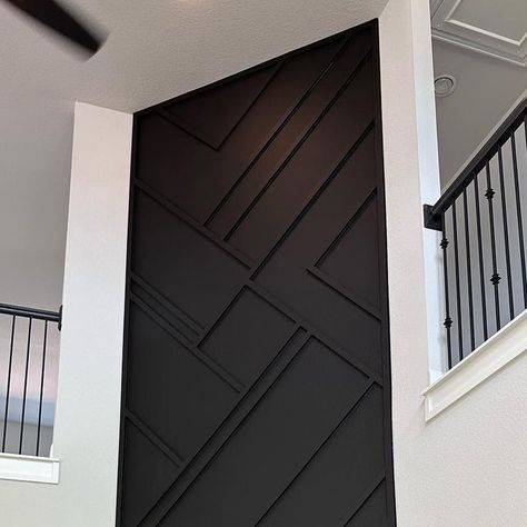 Geometric Accent Wall Stairwell, Black Stair Wall, Accent Wall Above Stairs, Black Accent Wall Fireplace, Geometric Fireplace Wall, Geometric Wall Paneling, Feature Wall Staircase, Entry Way Accent Wall, Fireplace Feature Wall Ideas