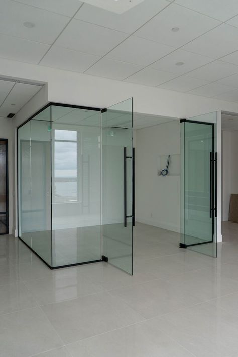 Transparent glass partitions with swing doors Office Partition Glass Design, Office Interior Design Glass Wall, Glass Partition With Door, Glass Wall Partition Design, Office Glass Wall Design, Glass Door For Office, Office Glass Door Design, Room Wall Aesthetic, Glass Wall Partition