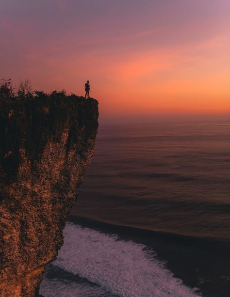 Come on in and join the road trip to Bali, Indonesia. This photo is inspired by the fear of being average. Bali travelogue will be soon released at https://www.roadtripwithraj.com/on-the-road/. Download this photo by Road Trip with Raj on Unsplash Standing On A Cliff, Nature Images Hd, The Encounter, Person Standing, Photo Story, Word Of The Day, Nature Images, Image Hd, Hd Photos