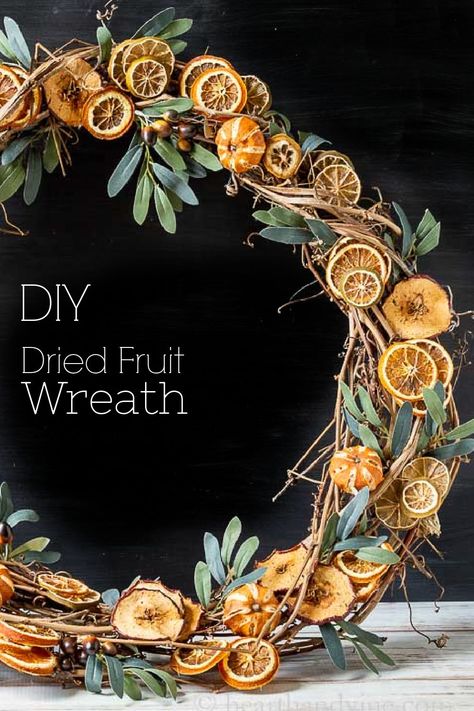 Make your own fragrant and natural wreath with dried fruit and a few artificial bits of greenery. Great for your holiday decor or any time of year. Farmer Christmas Decor, Decorating With Dried Oranges, Dried Fruit Christmas Garland, Dry Fruit Decoration Ideas, Dried Fruit Wreath, Making A Christmas Wreath, Homemade Wreaths Diy, Dried Citrus Decorations, Dried Citrus Wreath