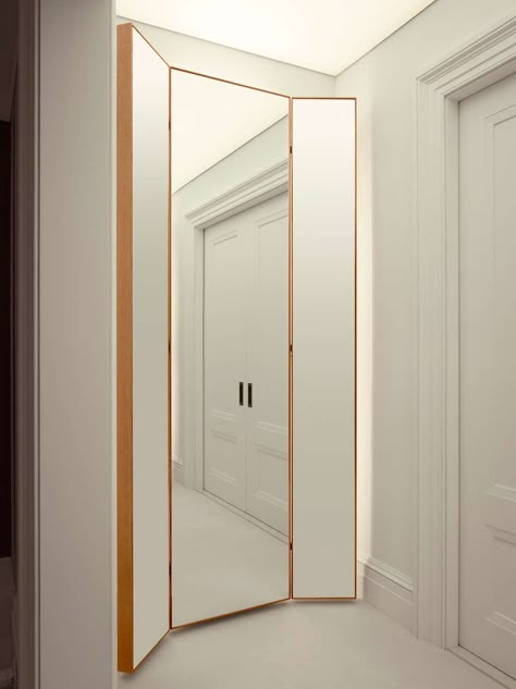 A floating three-way mirror is lit from above with a special ceiling that casts a diffused light onto the dressing area below. DESIGNER: Nitzan Design, NYC Three Way Mirror, 3 Way Mirrors, Dressing Room Mirror, Fitting Rooms, Design Motivation, Trifold Mirror, Fitting Room, Changing Room, Dressing Rooms