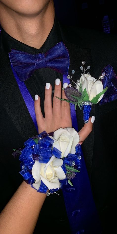 Royal Blue Tux Prom, Black Suit Royal Blue Tie, Royal Blue And Black Corsage And Boutonniere, Royal Blue Prom Looks Couple, Blue Suits For Prom, Royal Blue Tuxedo For Men Prom, Black Tux With Royal Blue, Black And Blue Prom Suit, Black And Blue Corsage