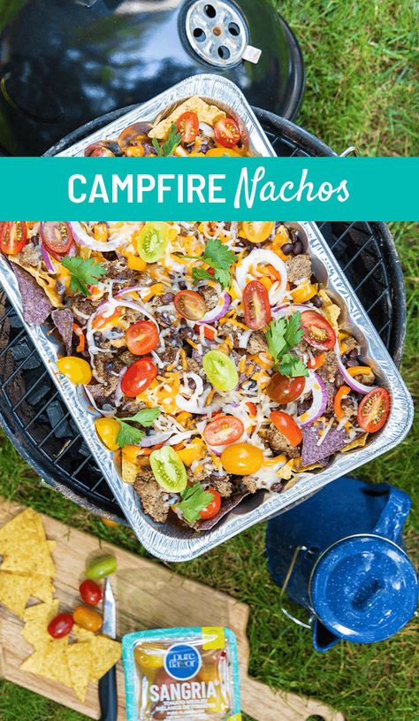 Some of the best camping recipes are made in one pan.  With these Campfire Nachos, you can spend more time relaxing by the campfire and less time cleaning up. Pro Tip: Cook your ground beef at home, freeze it and pack it in your cooler so that you don’t have to cook it at the campsite!  #nachos #camping #outdoors #campfire #summer #tomatoes #peppers Camping Salads, Best Camping Recipes, Campfire Nachos, Tomato Tarte Tatin, Grilled Romaine Lettuce, Nacho Recipes, Antipasto Kabobs, Heirloom Tomato Tart, Baked Parmesan Tomatoes