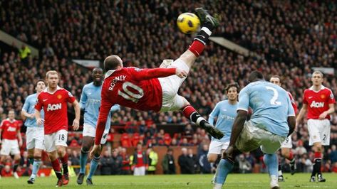 An iconic image in the derby’s history, Rooney hangs in mid-air and acrobatically volleys Nani’s cross beyond Joe Hart to seal a 2-1 victory in February 2011, moving league leaders United eight points ahead of their city rivals Manchester Derby, Anthony Martial, Manchester United Legends, Wayne Rooney, Europa League, Manchester City, Manchester United, Premier League, Manchester