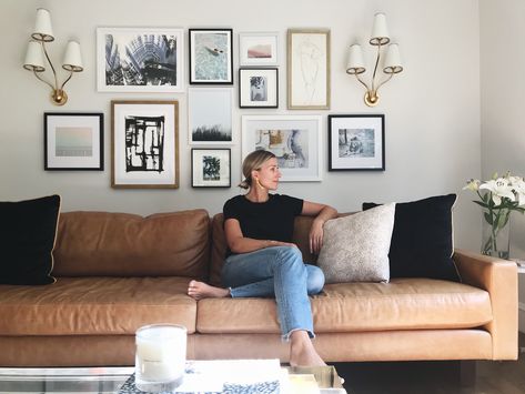 Gallery wall, leather couch, sconces, Wander + Lash at home, Eclectic gallery wall. Decorate Wall Behind Couch, Decorate Above Couch, Sconces Above Couch, Gallery Wall With Sconces, Decor Behind Couch, Wall Behind Couch, Home Eclectic, Couch Wall Decor, Photo Gallery Wall