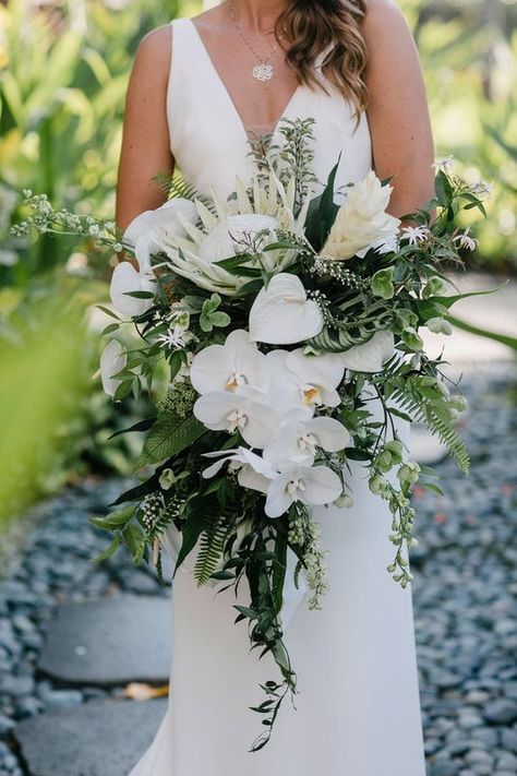 Tropical Lace Wedding Dress, Cascading Tropical Wedding Bouquets, Wedding Seating Chart Tropical, Mexico Wedding Bouquet, Tropical Floral Installation, Hawaiian Bouquet Wedding, White Protea, Brides Accessories, Beach Wedding Bouquet