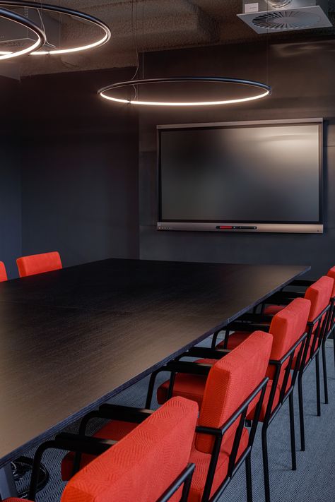 Red Accent Wall Office, Office With Red Accents, Black Conference Room, Red Conference Room, Red Office Design, Black Meeting Room, Red Office Decor Ideas, Red And Black Office, Black And Red Interior