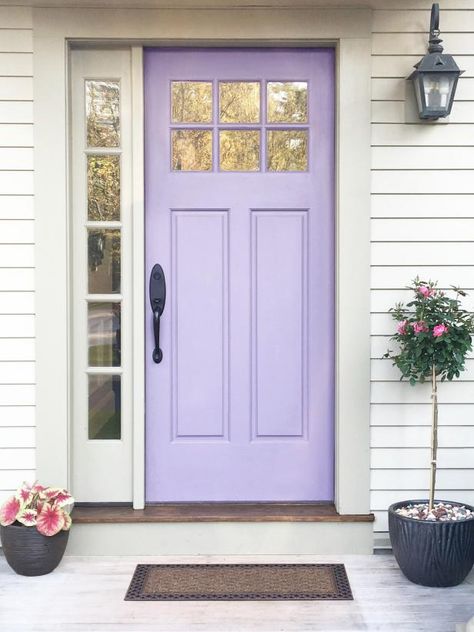 Houses With Purple Front Door, Purple House Door, Lavender Front Door Paint Colors, Purple Exterior Door, Lilac Front Door, Purple Doors Front House, Cream Siding, Lavender Front Door, Purple Front Door