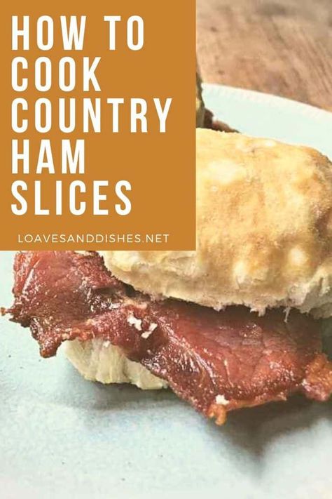 Salty, smokey, and the perfect bite with a soft southern biscuit. You’ll want to know exactly how to cook country ham slices for the perfect southern comfort food! #ham #breakfast #southern How To Cook A Cured Ham, Cooking Country Ham, Country Ham Breakfast, Christy Jordan Southern Plate Recipes, How To Cook Country Ham Slices, Ham Slices Recipes, Country Ham Biscuits, Country Ham Recipes, Breakfast Southern