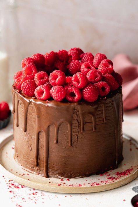 Vegan Chocolate Raspberry Cake, Vegan Raspberry Cake, Vegan Cake Recipe, Raspberry Chocolate Cake, Flavored Buttercream, Ganache Glaze, Vegan Chocolate Ganache, Chocolate Ganache Glaze, Cake Raspberry