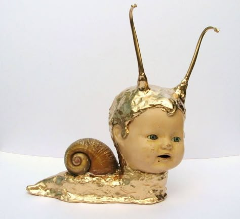 Giant Snail, Creepy Doll, Snail Shell, Art Brut, Creepy Dolls, Assemblage Art, Doll Art, Doll Parts, Weird Art