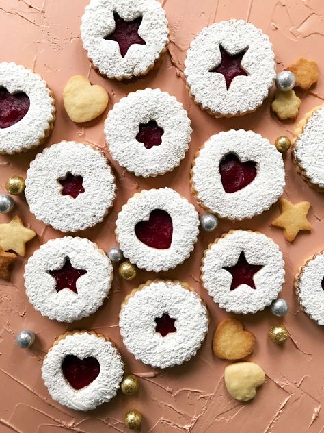 These cripsy cookies are sandwiched with the best cranberry snd orange jam. It’ll make you rethink your cranberry sauce from Thanksgiving. #recipe #cookies #holiday #christmas #linzercookies #cranberry Eggnog Cookies, Cranberry Jelly, Orange Jam, Cranberry Jam, Linzer Cookies, Orange Cookies, Christmas Biscuits, Jam Cookies, Cranberry Cookies