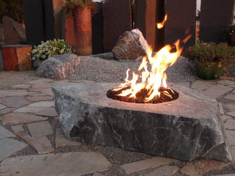 Looking for some distinctive natural stone products to enhance your landscaping project? Building a water feature for your yard and need something special to line it with? Duro Rock can help beautify property. Learn more... http://www.durorock.net/ Natural Fire Pit, Fire Pit With Rocks, Fire Rocks, Easy Fire Pit, Diy Outdoor Fireplace, Custom Fire Pit, Fire Pit Lighting, Outdoor Fire Pit Designs, Modern Fire Pit