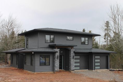 Black Gray House Exterior, Black Roof Grey Siding, Dark Gray With Black Trim Exterior, Black Trim Exterior House Grey, Grey House Black Trim Exterior, Grey House Brown Trim, Charcoal House With Black Trim, Black Windows Grey Siding, Dark Grey Siding With Stone