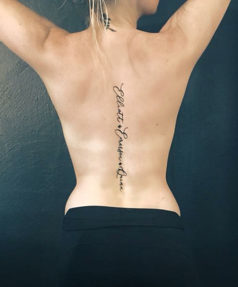 Kids name down spine!! 😍 Names On Back Tattoo, Names Down Spine Tattoo, Name Down Spine Tattoo, Spine Name Tattoo, Name Spine Tattoo, Spine Name Tattoos For Women, Name Tattoos On Back, Kid Tattoos, Tattoo Down Spine