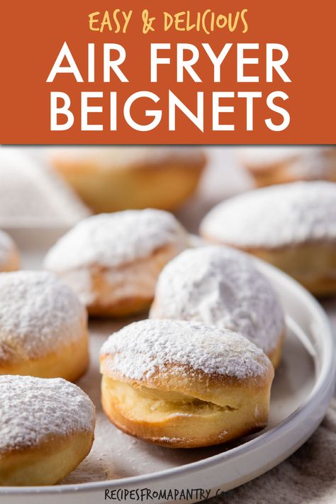 This recipe for Air Fryer Beignets gives you delectable beignets that are crispy on the outside and light and fluffy on the inside. Making beignets in air fryer means you can enjoy the delicious classic New Orleans style pastry without the added oil and calories of the traditional deep fried version. A perfect Sunday morning treat, you'll love how easy it is to make homemade air fryer beignets. Click through to get this awesome Air Fryer beignets recipe!! #airfryer #beignets #homemadebeignets Air Fryer Binet, Air Fryer Cronuts Recipes, Beignets In Air Fryer, Biscuit Beignets Air Fryer, Air Fryer Beniegts, Air Fried Beignets, Zeppoli Recipe Air Fryer, Air Fryer Beniegts Recipe, Air Fryer Beignets Easy